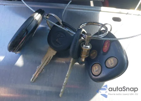 2004 Saturn L300 3 z USA, uszkodzony, nr VIN 1G8JL54R54Y520827